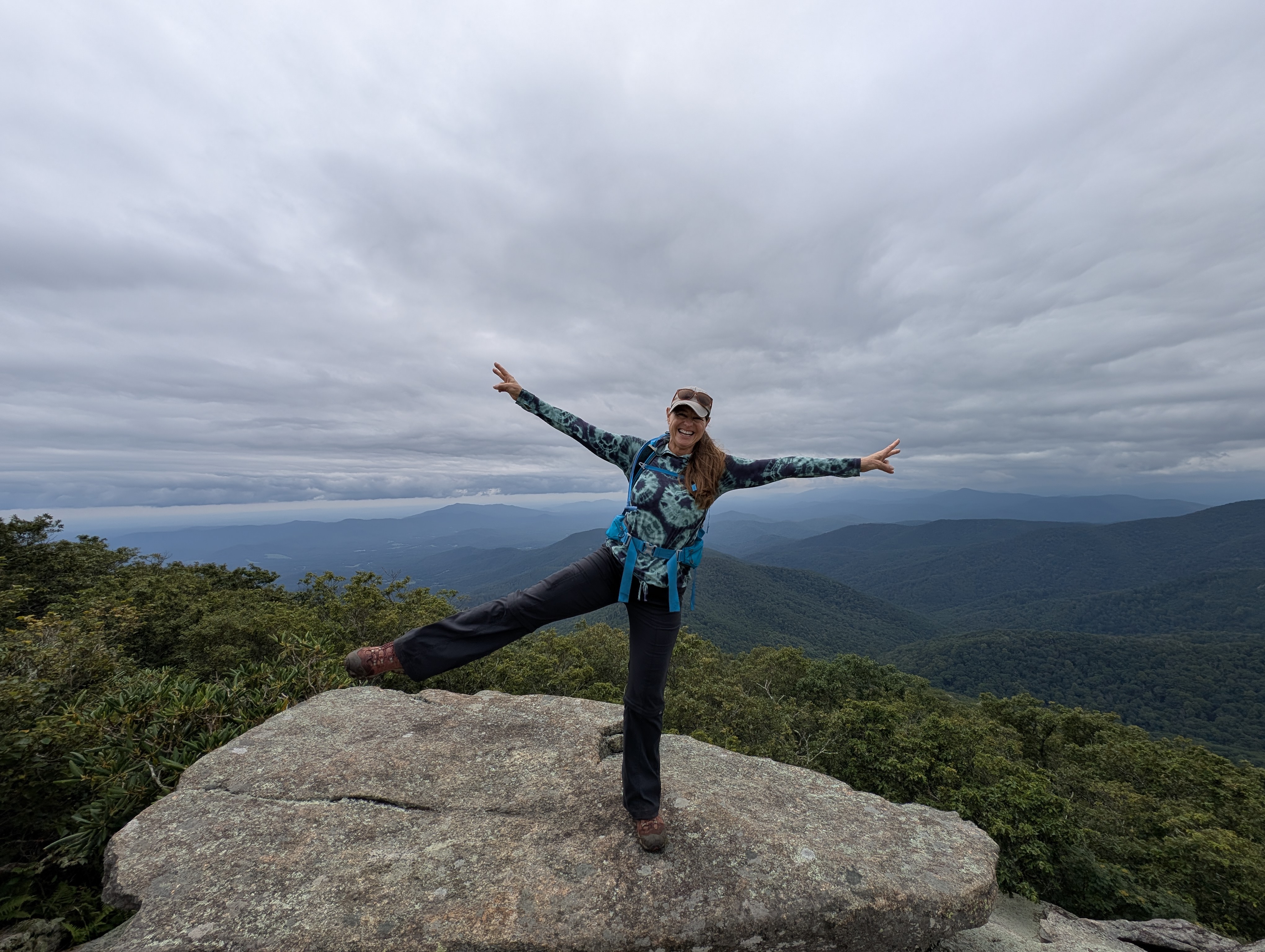 Diana Tynes in a balance pose on Blue Ridge mountaintop